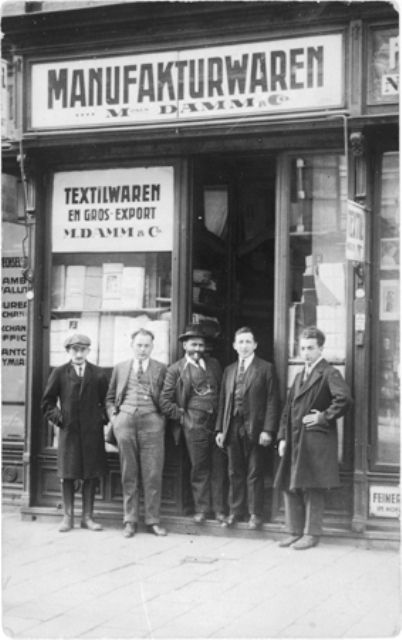 Jews in Vienna pose in front of their business